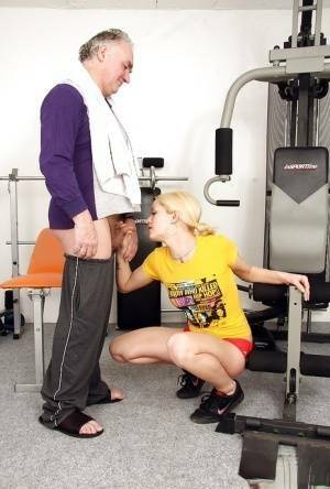 Young fitness chick in pigtails sucks off a much older man's cock on fangals.org