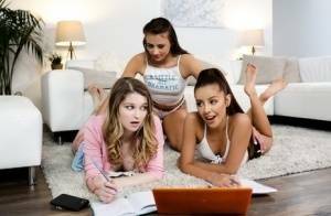 Young girls get busy with a lesbian threesome on a sofa ensemble on fangals.org