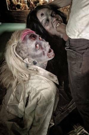 Fetish models Brittany Lynn and Jessie Lee giving head in Zombie threesome on fangals.org