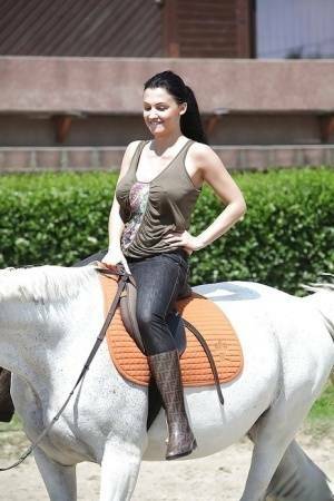 Pornstar Aletta Ocean is riding a horse outdoor in glasses on fangals.org