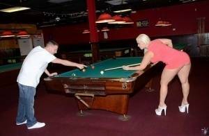 Curvy slut gets nailed on a pool table and jizzed over her big jugs on fangals.org