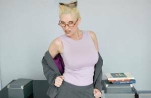 Mature teacher in glasses Devon Lee exposing her smashing goodies on fangals.org