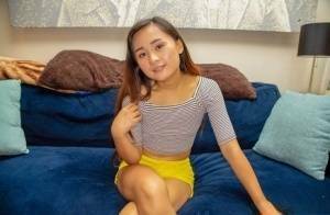 Petite Asian teen Elle Voneva engages in POV sex with a white cock on fangals.org