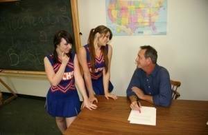 2 cheerleaders jerk off their geography teacher on top of his desk on fangals.org