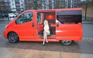 Mature blonde Barby Slut exposes herself inside a camper while in the city on fangals.org