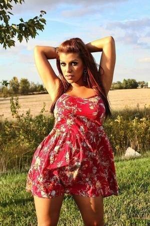 Amateur solo girl Briana Lee flashes her tits and twat in the countryside on fangals.org