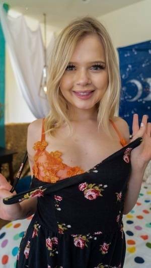 Cute blonde teen Coco Lovelock gets naked on her bed in ankle strap heals on fangals.org