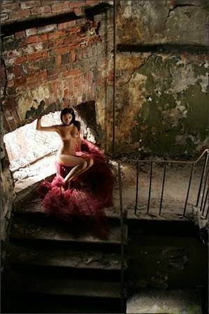 Slim brunette with a great ass models totally naked in deserted building on fangals.org