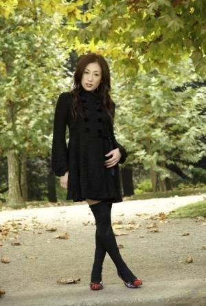 Fully clothed Japanese teen models in the park in black clothes and stockings - Japan on fangals.org