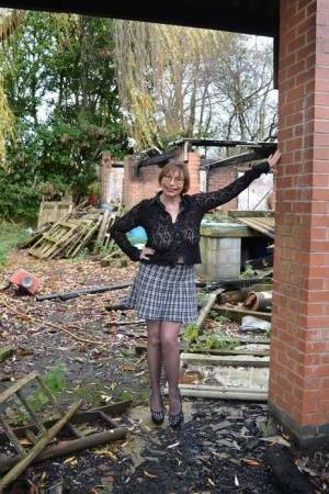 Amateur chick Barby Slut strips to her heels on a demolition site on fangals.org