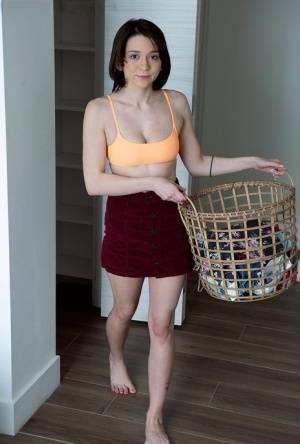 Young brunette Riley Jean makes her nude debut on a bed during laundry day on fangals.org