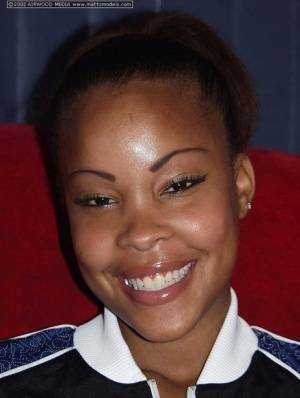 Black amateur Candice flashes a nice smile before baring her great body on fangals.org