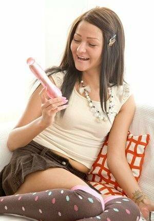 Cute teen slides a vibrator up her tight asshole wearing over the knee socks on fangals.org