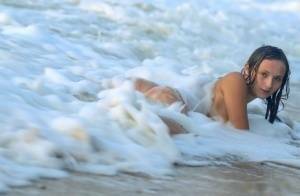 18-year-old beauty Tressa G strikes great nude poses in ocean surf on fangals.org