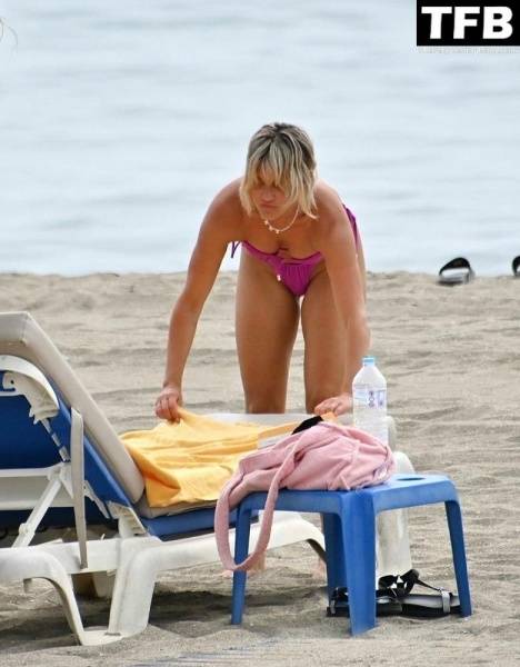 Ashley Roberts Enjoys the Beach on Holiday in Marbella on fangals.org