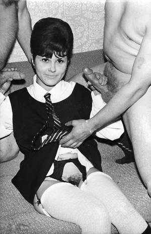 Small titted vintage schoolgirl removes her uniform for a big cock threesome on fangals.org