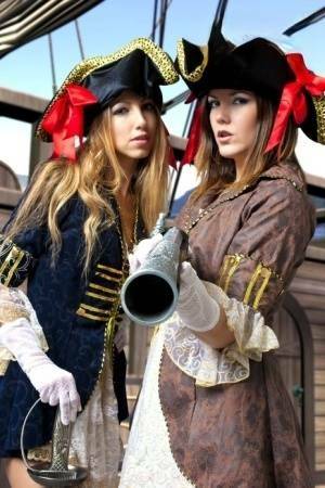 Female pirates partake in lesbian foreplay while on board a vessel on fangals.org