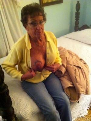 Dirty amateur granny shows her sexy naked body and kisses a young stud on fangals.org