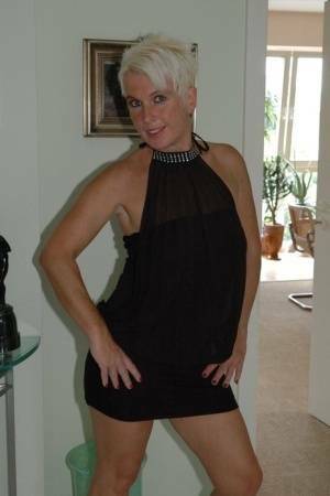 Blonde mature Claudia stipping out of a black dressAmateur,Mature,Stripping on fangals.org