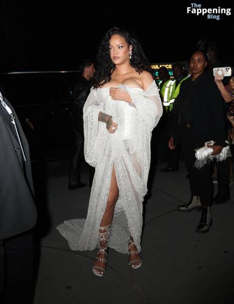 Rihanna Displays Her Curves in a White Dress (13 Photos) on fangals.org