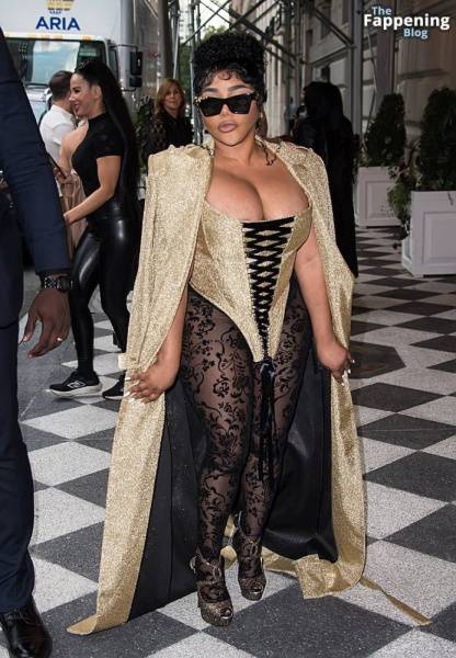 Lil’ Kim Flashes Her Areola as She Attends the Christian Siriano Fashion Show (32 Photos) - Usa on fangals.org